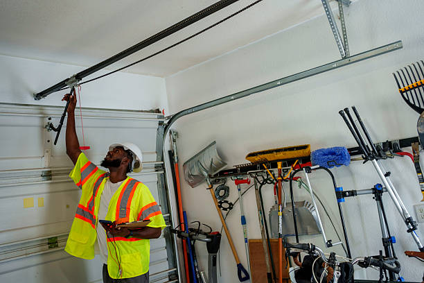 Professional Garage Door Roller Replacement technician working in De Kalb, TX